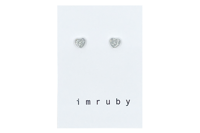 Hi! I'm BIBI, a silver glitter heart set of 2 stud earrings.

If you are looking for a perfect everyday staple, stud earrings may be exactly what you need! They are very tiny and so cute! These earring sets are perfect for numerous piercings or just to mix and match! 

Packed in a reusable bag to keep your jewelry shiny and clean.