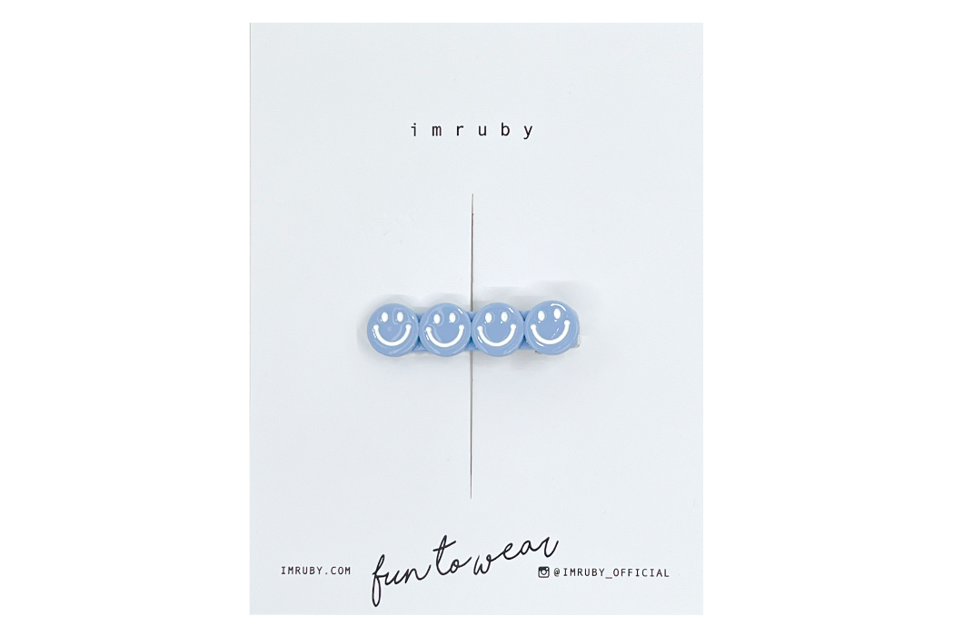 Hi! I'm EMILY, a light blue smiley clip.

Hold back bangs, clip back hair, or simply use for stylistic purposes by adding some flair to your hair. Mix-and-match, and layer these hair clips or wear on their own for a soft, seasonal look.