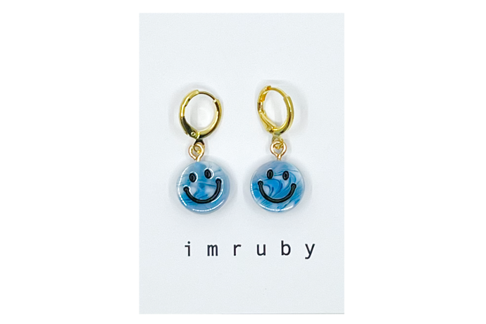 Hi! I'm IZZY, a hippie blue smiley set of 2 drop earrings.

Add a touch of glam to your style with a pair of cute drop earrings! These earring sets are perfect for numerous piercings or just to mix and match! 

Packed in a reusable bag to keep your jewelry shiny and clean.