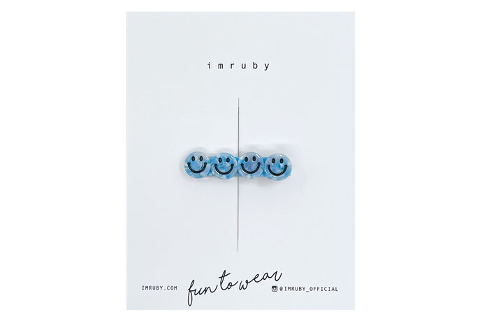 Hi! I'm IZZY, a hippie blue smiley clip.

Hold back bangs, clip back hair, or simply use for stylistic purposes by adding some flair to your hair. Mix-and-match, and layer these hair clips or wear on their own for a soft, seasonal look.