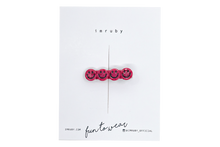 Load image into Gallery viewer, Hi! I&#39;m JUSTINE, a purple flamed smiley clip.

Hold back bangs, clip back hair, or simply use for stylistic purposes by adding some flair to your hair. Mix-and-match, and layer these hair clips or wear on their own for a soft,&nbsp;seasonal look.