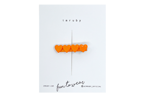 Hi! I'm MARIE, an orange heart clip.

Hold back bangs, clip back hair, or simply use for stylistic purposes by adding some flair to your hair. Mix-and-match, and layer these hair clips or wear on their own for a soft,&nbsp;seasonal look.